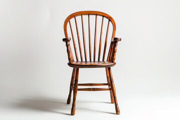 Traditional Windsor chair showcased on a solid white backdrop.