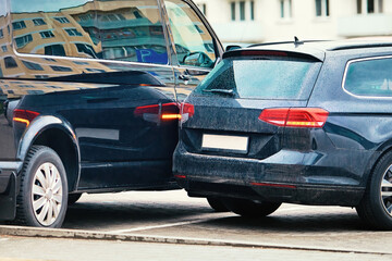 Car accident in parking lot, maneuvering unsafely in confined spaces. Parking accident due to...