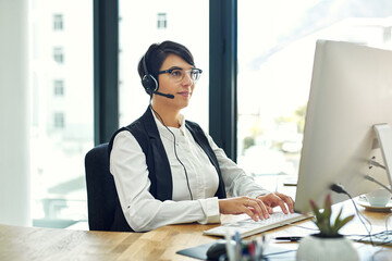 Woman, computer and smile as employee at call center with customer or client support and service....