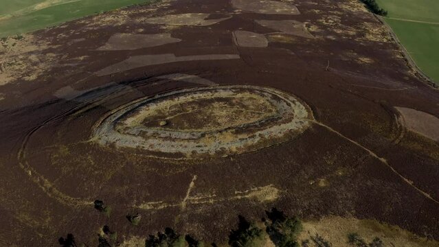 White Caterthun prehistoric hillfort, Brechin, Scotland. Possibly Pictish, on earlier Bronze or Iron Age occupation site. Video fly in looking NW