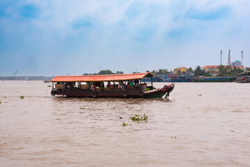 Traditional boats on famous Mekong river in Vietnam