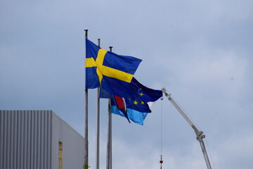 flags of Sweden, EU and Luxembourg