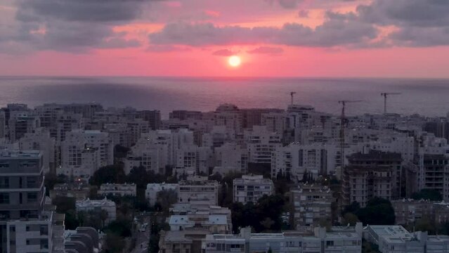 Beautiful colorful sunset in the white city of Israel.