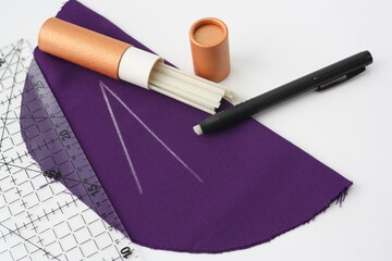 Crayons and crayons pen, tailor set. Concept of needlework, sewing, cutting fabric.