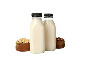 PNG, Bottles of milk and nuts in bowls, isolated on white background