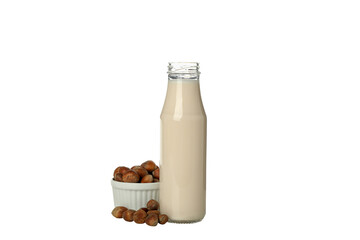 PNG, Bottle of milk and hazelnuts in bowl, isolated on white background