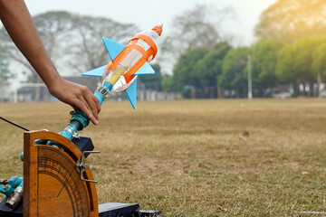water rocket on launch pad. It is an activity that promotes science knowledge and skills for...