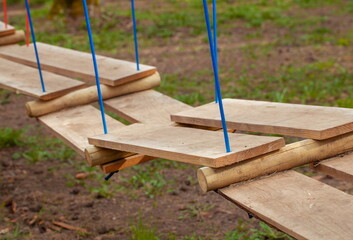 wooden dexterity trail on the playground in the park