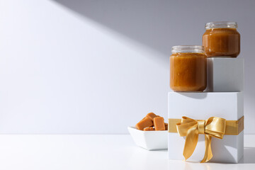 Salted caramel in a jar with a gift