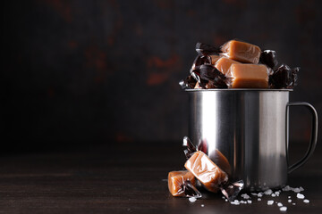 Cubes of salted caramel in a metal cup