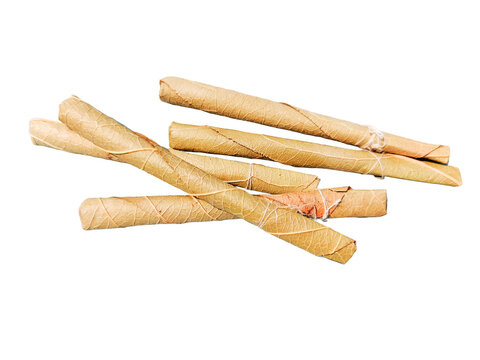 Bidi or Beedi, A beedi is a thin cigarette or mini-cigar filled with tobacco flake and commonly wrapped in a tendu or Piliostigma racemosum leaf tied with a string or adhesive, bidi isolated 