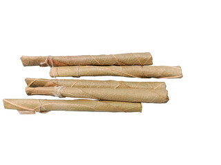 Bidi or Beedi, A beedi is a thin cigarette or mini-cigar filled with tobacco flake and commonly wrapped in a tendu or Piliostigma racemosum leaf tied with a string or adhesive, bidi isolated 