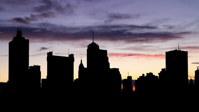 Tennessee: Memphis downtown skyline at Twilight, Time Lapse at Dusk with Colourful Sky and Dark Silhouette of Slyscrapers, USA