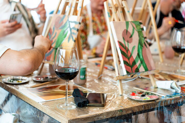 Painting workshop. Friends painting together in art class