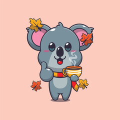 Cute koala with coffee in autumn season.