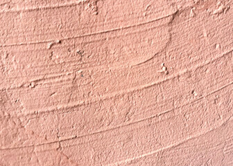 old pink plaster on the wall abstract background