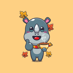 Cute rhino with coffee in autumn season. Mascot cartoon vector illustration suitable for poster, brochure, web, mascot, sticker, logo and icon. © Artprodite