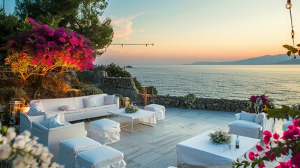 Cliffside event setup overlooking the Mediterranean, vibrant bougainvillea and elegant white seating, tranquil sea breeze, dawn lighting