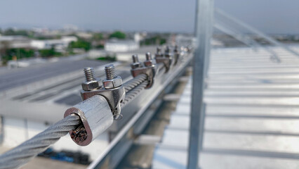 the fastening of stainless steel wire ropes with safely locking U-bolts.  