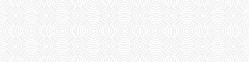 Seamless trend ornament of circles and arcs, geometric white shapes for textiles and wallpaper. Abstract panoramic pattern on a gray background for a New Year or wedding cover or card.