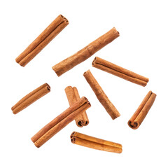 floated Cinnamon sticks falling isolate on transparency background PSD