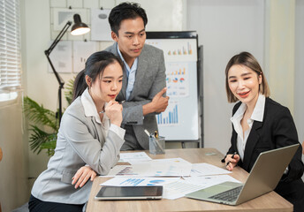 Asian businessmen, women and men Talk about new projects, presents at home office.