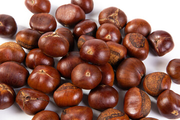 closeup of roasted chestnut on white background.