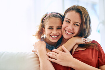 Mom, girl and hug in portrait with smile for support, care and appreciation at family home. Kid,...