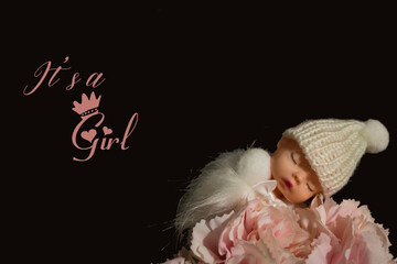 It's a girl announcement Baby doll on pink flowers with black background wallpaper