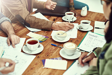 Business team, writing and paperwork with coffee, research and analysis of company, growth and...