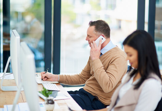 Phone call, business and mature man in office for discussion, schedule or confirm meeting with client. Conversation, technology and consulting agent for networking, negotiation or feedback on deal