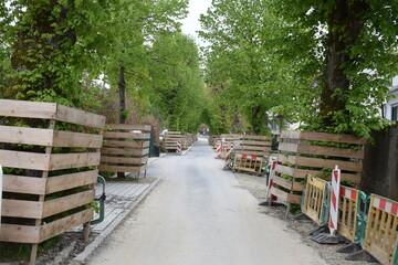 street construction site with tree fences