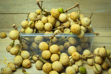 Langsat or Duku fruit. Lansium parasiticum. Fruits originating from Southeast Asia - obrazy, fototapety, plakaty