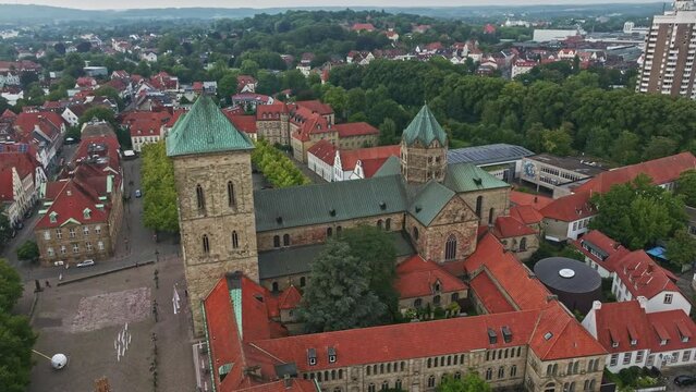 Aerial drone view of Dom St. Petrus in Osnabr&uuml;ck, Germany. St. Peter's Cathedral serves as the cathedral of the Roman Catholic Diocese of Osnabr&uuml;ck. 