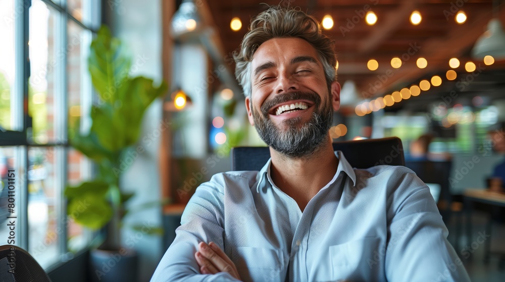 Wall mural Portrait of a Smiling Middle-Aged Man in Office Setting