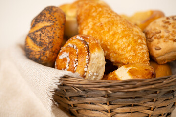 delightful assortment of freshly homemade baked pastries, including cheese buns, poppy seed buns,...
