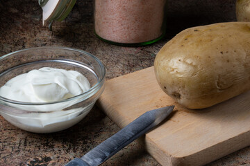 potatoes on a wooden board