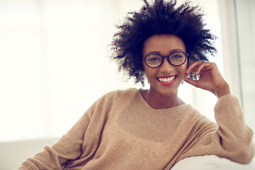 Relax, happy and portrait of black woman in home for resting, chill and comfort on weekend....