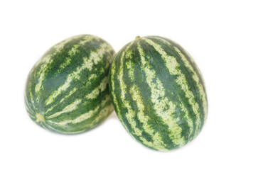 Two watermelon fruits isolated on white background. Concept, seasonal fruit. Agriculture crops. Healthy eating.      