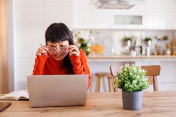 Woman working from home having conference call