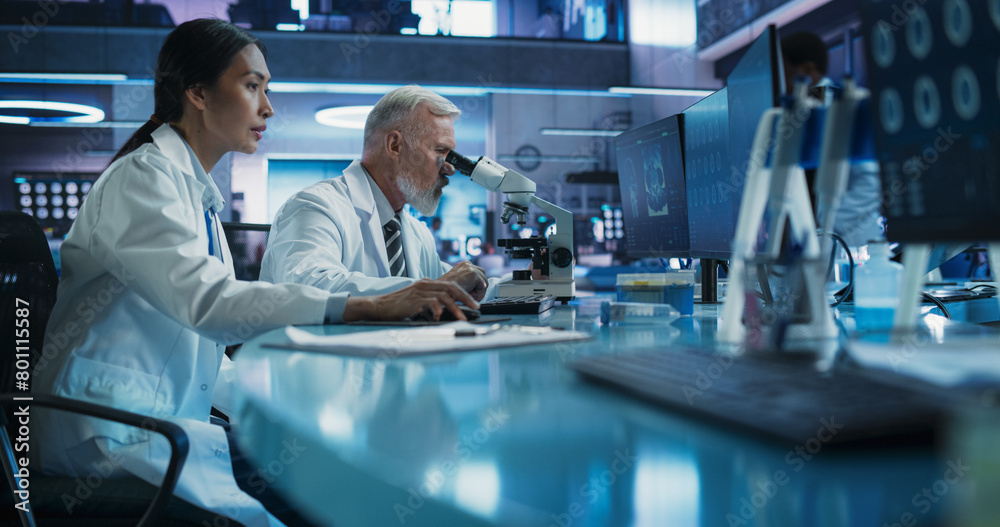 Poster biotechnology medical research center: female asian neurologist using desktop computer and talking t
