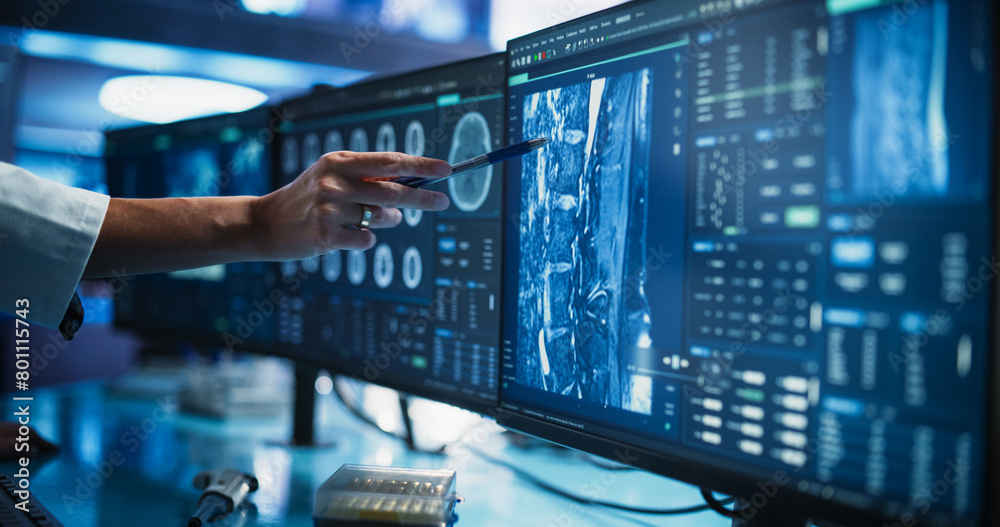 Aufkleber modern cancer research medical center: anonymous doctor pointing at desktop computer monitor with 3d