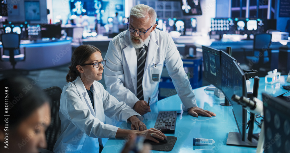 Poster biotechnology research laboratory: two caucasian doctors discussing ct brain scan on computer. focus