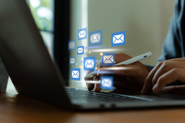 Man hand using laptop with email icon, Receive new message, Email marketing concept.