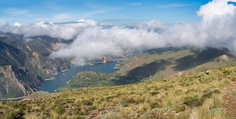 Hiking Trail Above the Clouds near Canales Reservoir