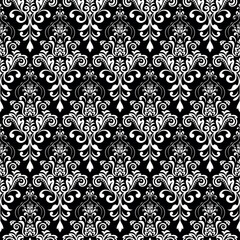 Wallpaper in the style of Baroque. Seamless vector background. White and black floral ornament. Graphic pattern for fabric, wallpaper, packaging. Ornate Damask flower ornament.