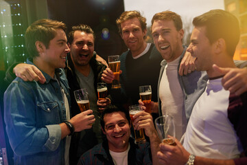 Men, beers and cheers with friends drinking at club, restaurant or party with happiness. People,...