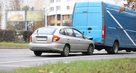 Naklejka premium Car insurance concept. Two car damage on road city street