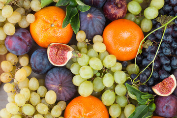 Bright Italian food background with colorful fruit and berries