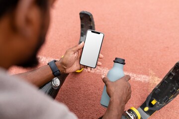 Man looking at his iPhone screen